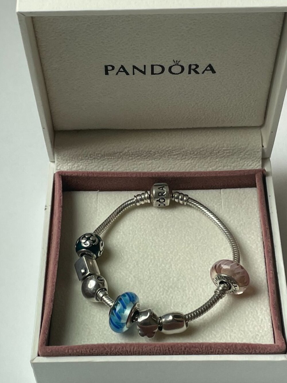 Pandora: silver 7” bracelet with seven charms